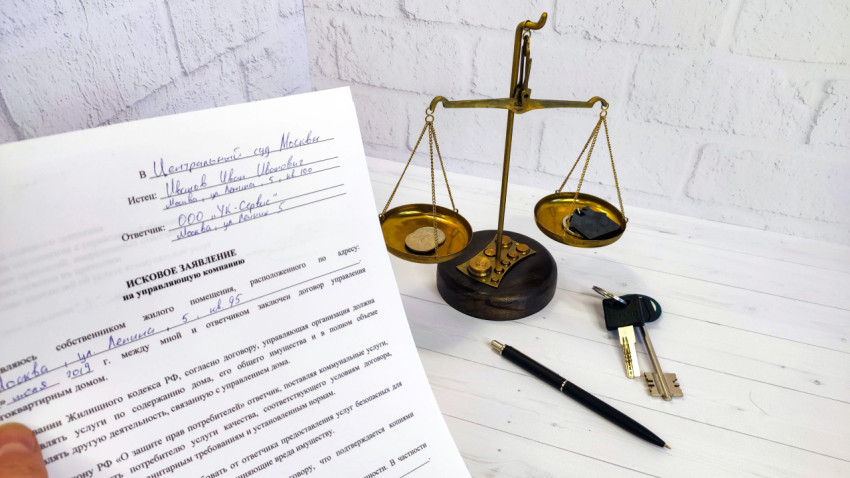 Исковое заявление к управляющей компании ЖКХ на фоне рычажных весов