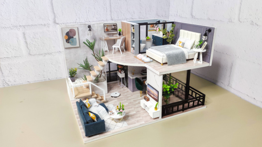 Миниатюрная двухуровневая модель современного интерьера с мебелью