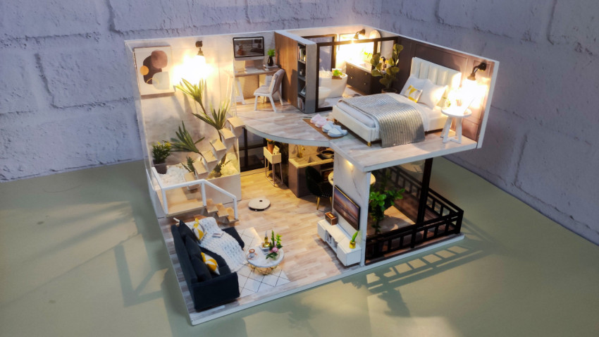 Миниатюрная двухуровневая модель современного интерьера с мебелью и подсветкой