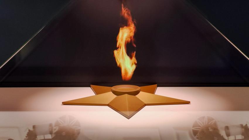 Экспозиция Вечного огня в музейной витрине