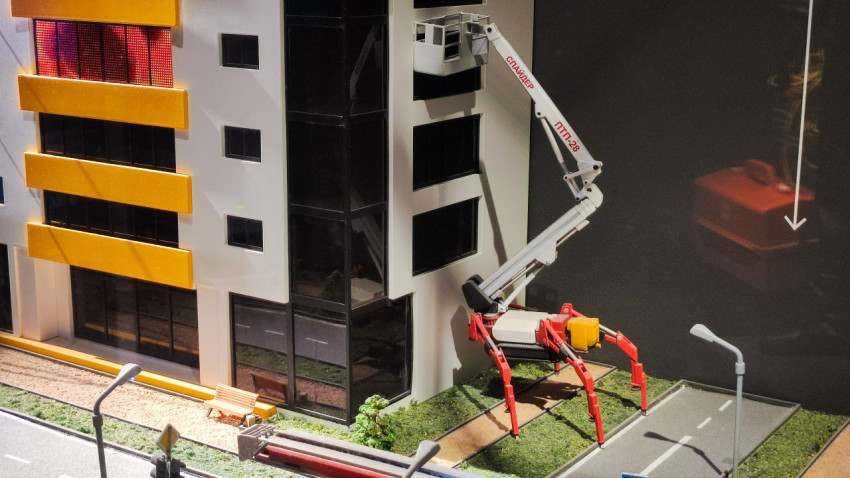 Макет пожаротушения с автоподъёмником у жилого здания