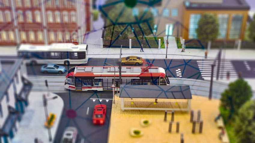 Макет городской транспортной системы с трамваем и автобусами