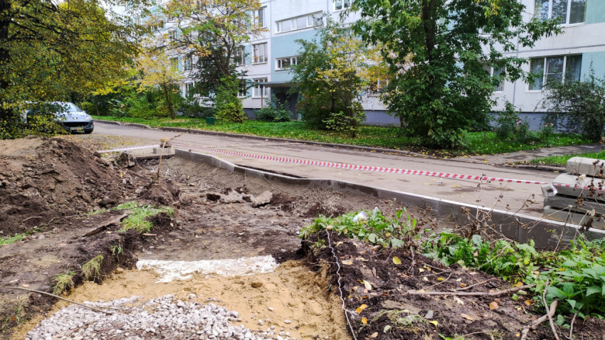 Строительство пешеходной дорожки: устройство основания и монтаж бордюров