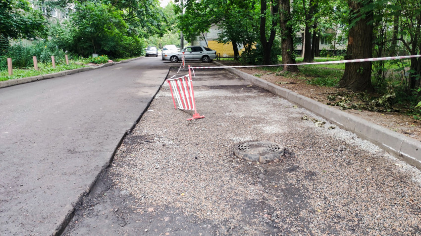 Ремонт дворовой парковки с поднятым люком