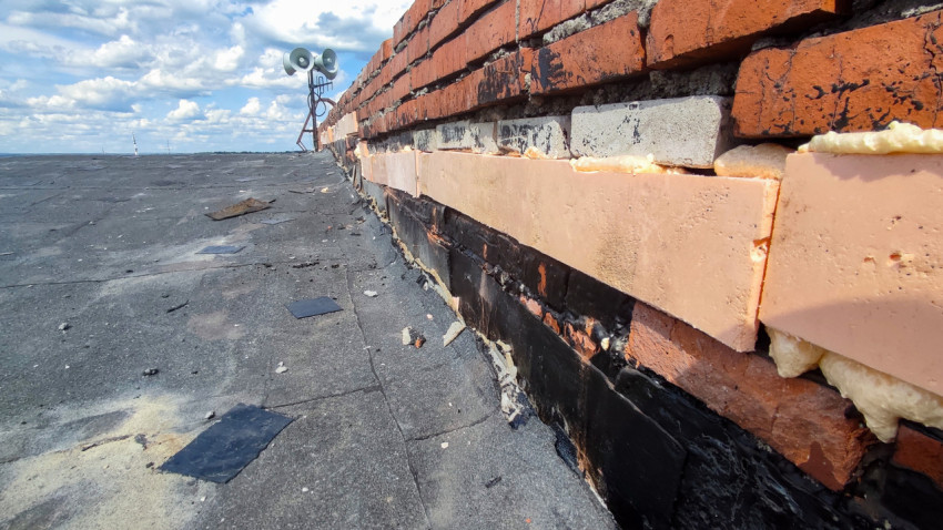 Утепление парапета на крыше здания