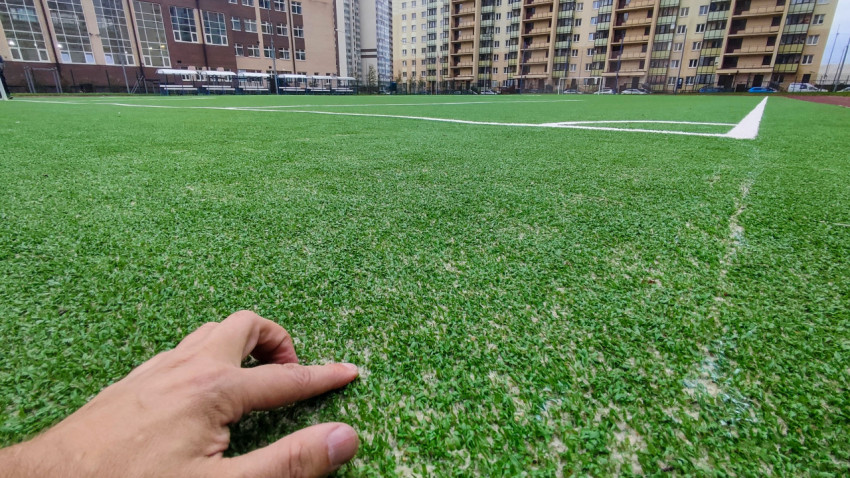 Проверка качества синтетического покрытия футбольного поля