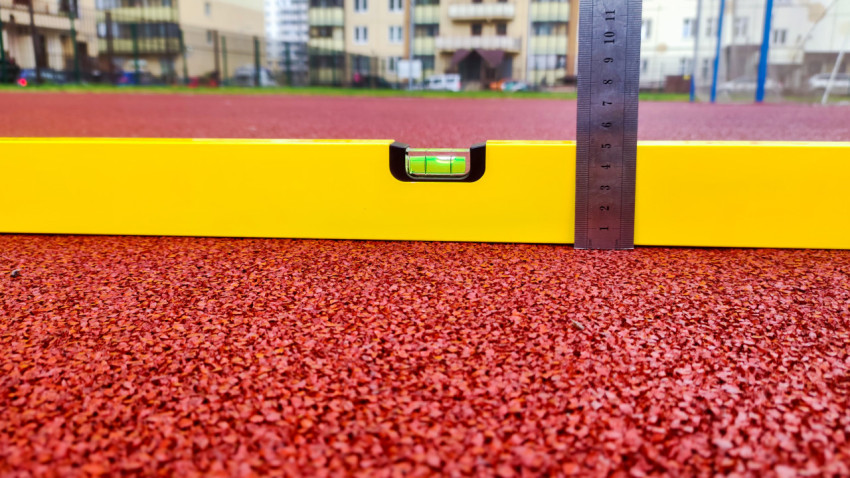 Контроль толщины резинового покрытия на спортивной площадке