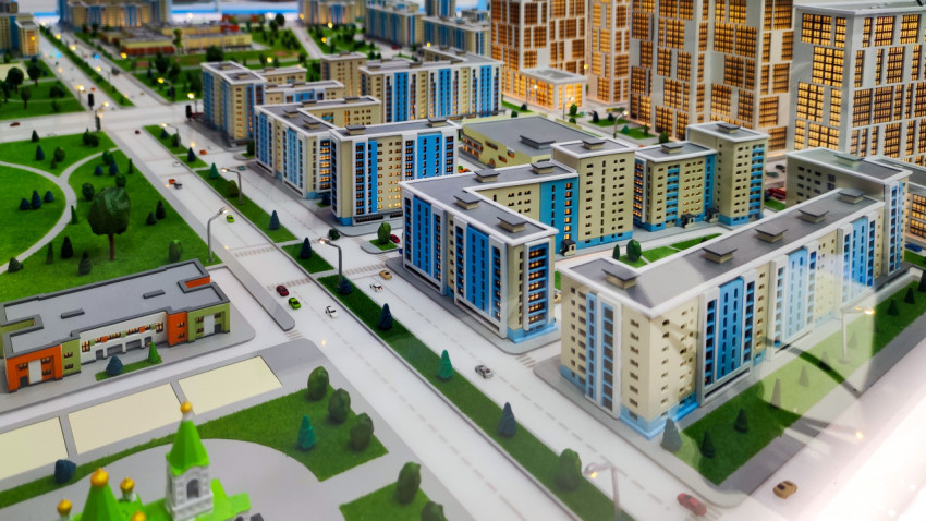 Макет городского квартала с жилыми домами и парковой территорией