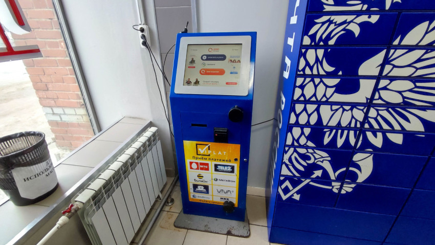 Платежный терминал Киви в магазине