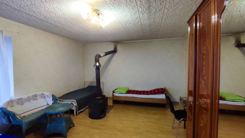 Комната с печным отоплением и несколькими спальными местами