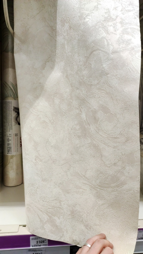 Образец бежевых флизелиновых обоев с рельефной текстурой